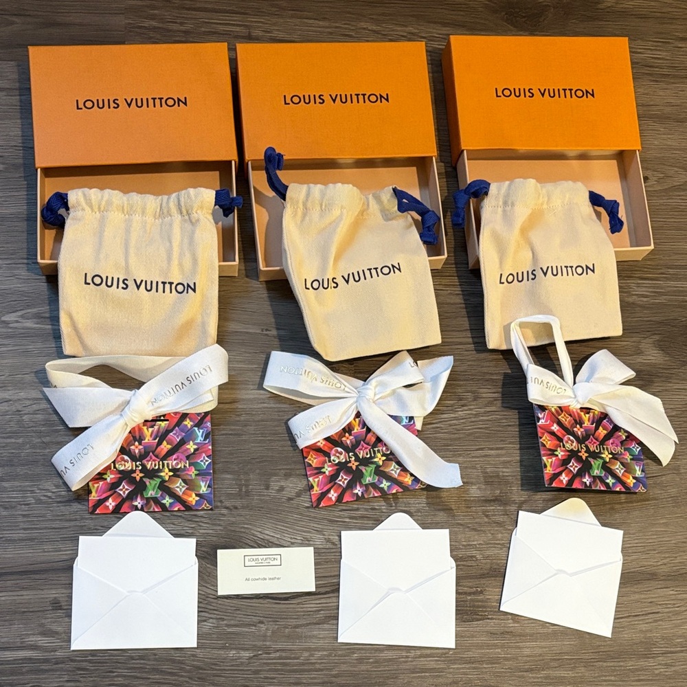 Louis Vuitton Orange Boxes with White Ribbons